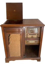 Magnavox Radio Record Player Cabinet. Extra  Needles 34x19.5x37.5tall. Shows Some Damage.