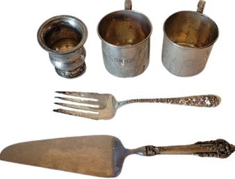 Silver Cups And Creamer. Silver Fork And Silver Handle Serving Knife.