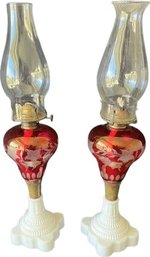 Two Oil Lamps With Red Glass