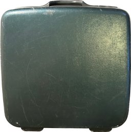 Samsonite Hard Shell Suit Case- Dark Green, 23x11x23. Includes Suiter Feature. No Keys Included. Slight Wear