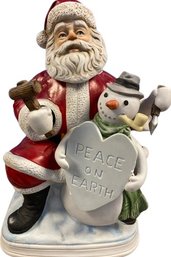 2002 Santa By Melody In Motion. Hand Made And Hand Painted Porcelain, Signed By Artist. Moves And Sings