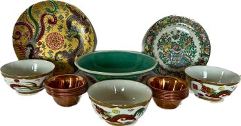 Collection Of Dragon Plates, Dragon Bowls, And Copper Sauce Cups
