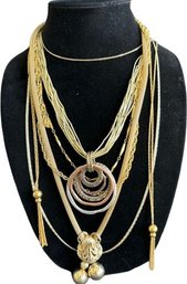 7 Gold Tone Necklaces
