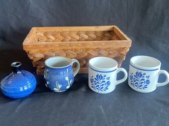 Basket With 2 Blue And White Coffee Mugs, 1 Blue Floral Pottery Coffee Mug, Blue Pottery Vase.