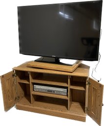 Samsung 46in TV With Roku Stick, DVD Player, And TV Stand (36x22x22)