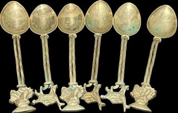 Silver Spoons With Alpaca And Person Icons On The Top Of The Spoon