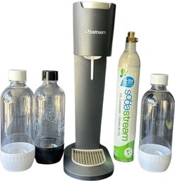 Soda Stream Machine, Carbonator, And Three Plastic Reusable Bottles