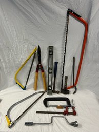 Assortment Of Tools- Level, Clamp, Shears, Orange Saw Is 38in