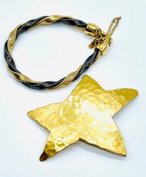 Goldtone Star Pin. Goldtone & Black Monet Bracelet.