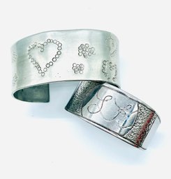 Silvertone, Cuff Bracelets. One Initialed LK. Heart Design On The Other.