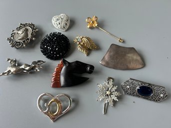 Vintage Pins With Various Crystals, Stones, And Metals