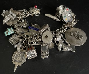 Charm Bracelet Packed With Many Sterling Silver Charms.
