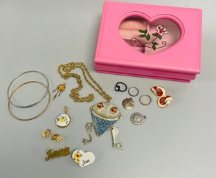 Pink Jewelry Box Mixed With A Variety Of Chains, Earrings And Pins