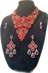 Red Gemstones & Rhinestones Necklace And Matching Pierced Earrings. Black Velvet Display Stand Included.