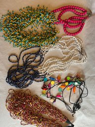Five Womens Beaded Costume Jewelry Necklaces In A Variety Of Colors.
