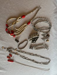 A Variety Of Womens Coral & Silvertone Costume Jewelry