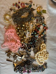 A Variety Of Costume Jewelry: Beads, Charms & Earrings.