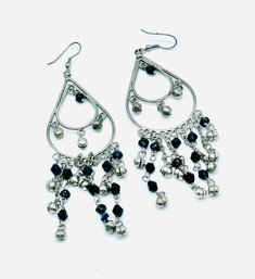 Pierced Silvertone Dangling Earrings With Black Gemstones.
