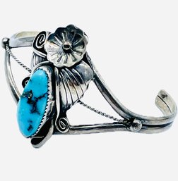Sterling Bracelet With Turquoise And Flower Design. 23.00g