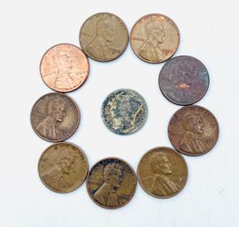 Pennies: 1957, 1998, 1944, 2008, 1958, 1946, 1952. Very Old Dime. Date Not Legible