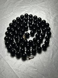 25 Inch Necklace With 69 Black Onyx Beads & A 14K Yellow Gold Clasp