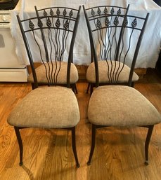 4 Brown Metal Dining Chairs With Leaf Details. Cushions Show Staining. 39 Tall 17deep And Wide.