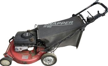 Snapper Lawn Mower W/ Key And Bag. Mower Not Currently Running, Seems To Be In Decent Shape , Needs TLC