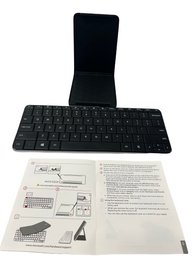 Microsoft Keyboard With Protective Cover That Doubles As Tablet Stand