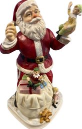 1998 Melody In Motion Hand Made And Hand Painted Porcelain Santa Claus Figurine (13x7x6)