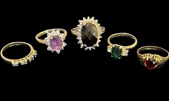5 Gold Toned Rings With Gems
