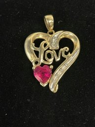 10K Gold Ring With Red Stone And 10K Gold Heart Pendant
