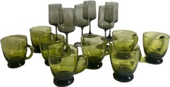 8 Green Glass Coffee/tea Mugs 3x3. 6 Smoked Glass Wine Glasses 2x6.