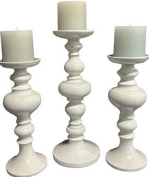 3 White Candle Holders And Candles