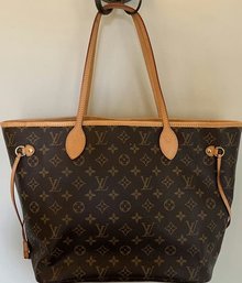 Louis Vuitton Neverfull MM With Clutch: Lightly Used, Few Scuffs.