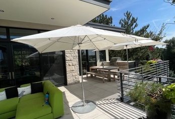 Large, Sturdy Cream Colored Patio Umbrella With Metal Base