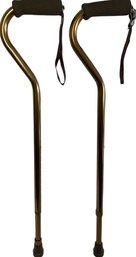 Pair Of Identical Metal Walking Canes With Foam Pad Handle And Adjustable Height