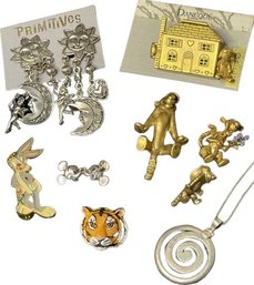 Playful Collection Of Earrings, Lapel Pins, And Pendants