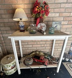 Outdoor Entryway Table With Lamp, Flowers, Vase, Firetruck And Other Small Trinkets