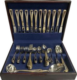 Stainless Silverware Set From International With Gold Tone Trim-70 Pieces