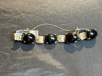 7.5 Inch, 14 Karat Yellow Gold And Black Jade (nephrite) Bracelet