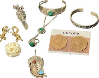 Sterling Cuff Bracelets And Pendants. Goldtone Earrings, Coin Pierced Earrings, And Carved Pendant.
