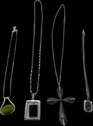 Four Silver Tone Necklaces With Charms. Various Lengths