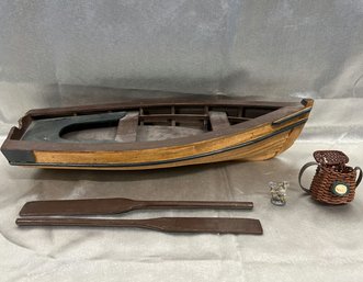 Wooden Hand Made Row Boat W/ Oars, Viking Figurine, And Small Wicker Basket