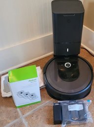 Roomba I7 With Extra Bags . Turns On. 2 Of 2