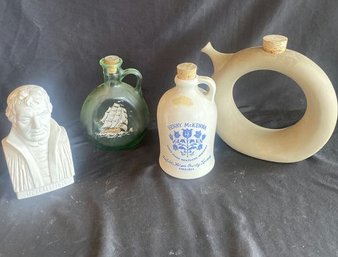 Variety Of Jugs With Cork Plugs And Bust Of  DM Luther.