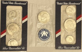 Coins: (2) 1776-1976 United States Bicentennial Silver Proof Sets And (1) 1974 Eisenhower Silver Dollar