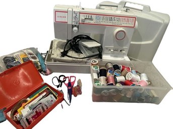 Singer Sewing Machine & Accessories. Untested.