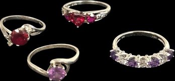 4 Silver Tone  Rings With Gems, All Sz 7, Except Single Red Stone Is Sz 6