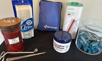 Candles, First Aid Kit, Aquaphor, Quip Water Flosser, Big Jar Of Blistex Chapsticks