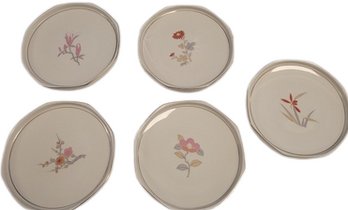 White Ceramic Plates With Flower Print And Gold Inlay.